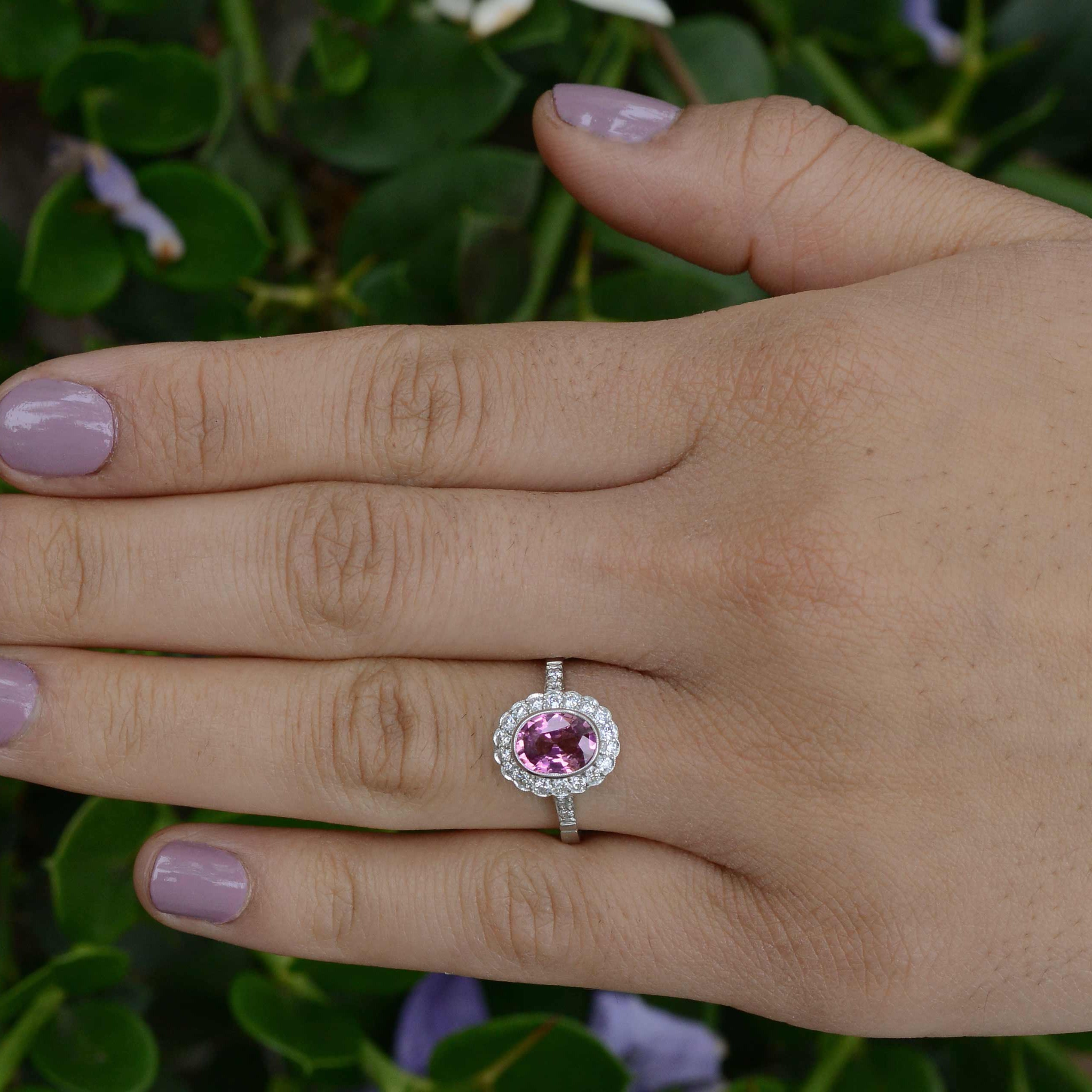 A natural pink 1.50 carat oval pink sapphire wedding ring.