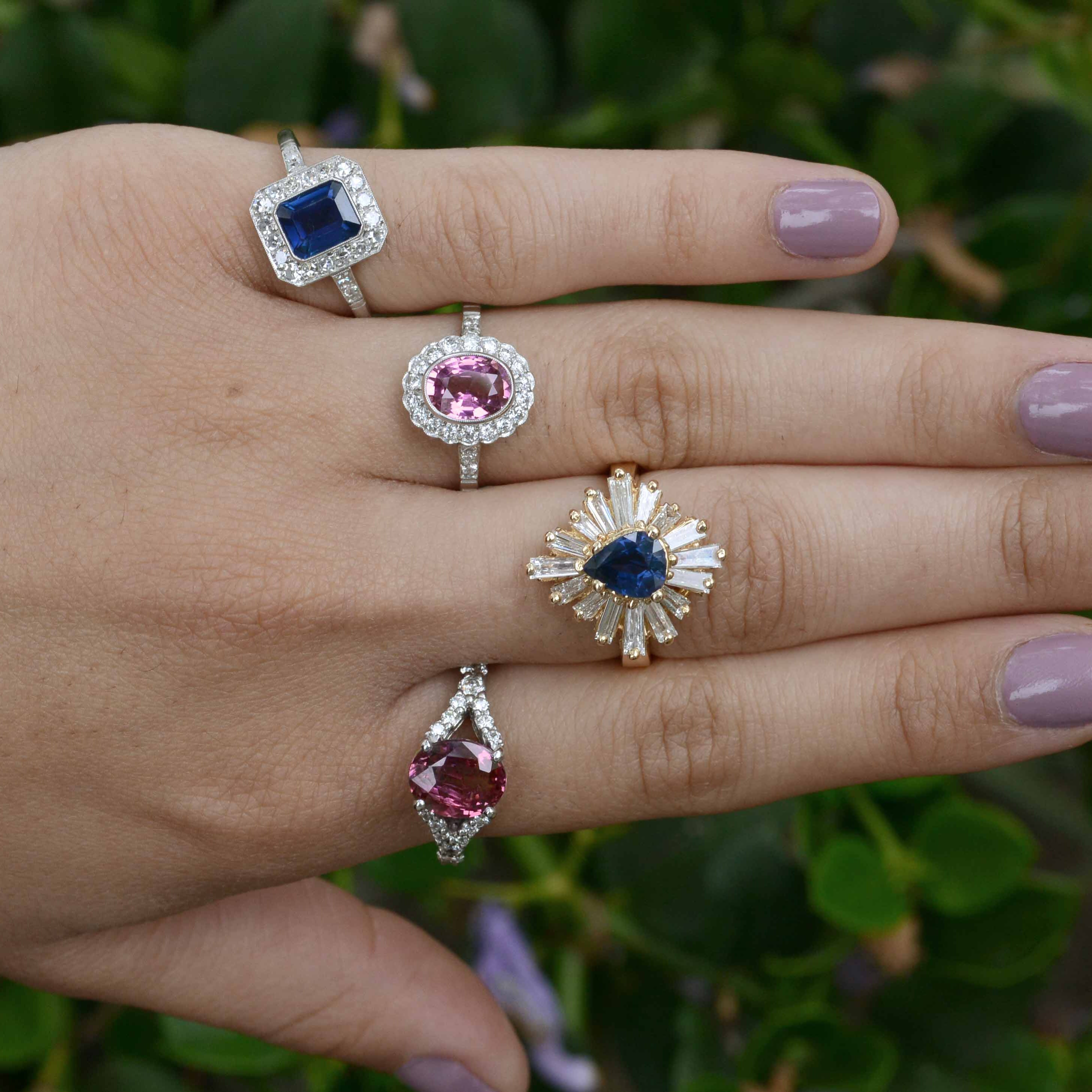 Sapphire and diamond halo Art Deco engagement rings.