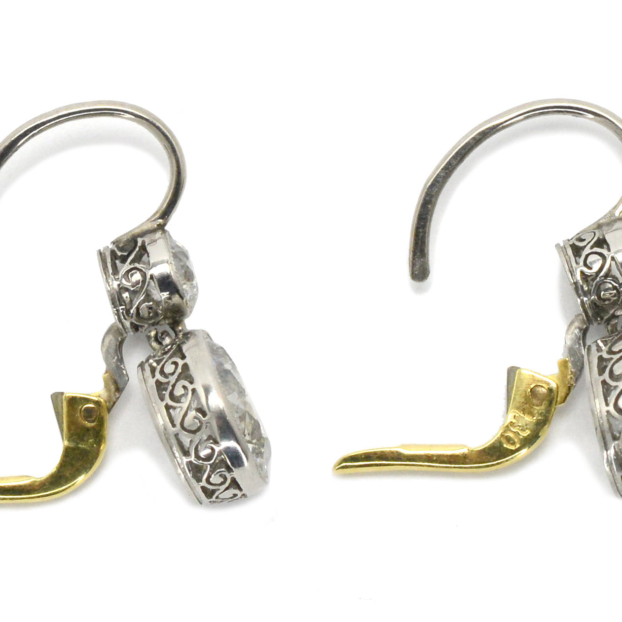 Two tone Edwardian revival earrings crafted of both platinum and yellow gold.