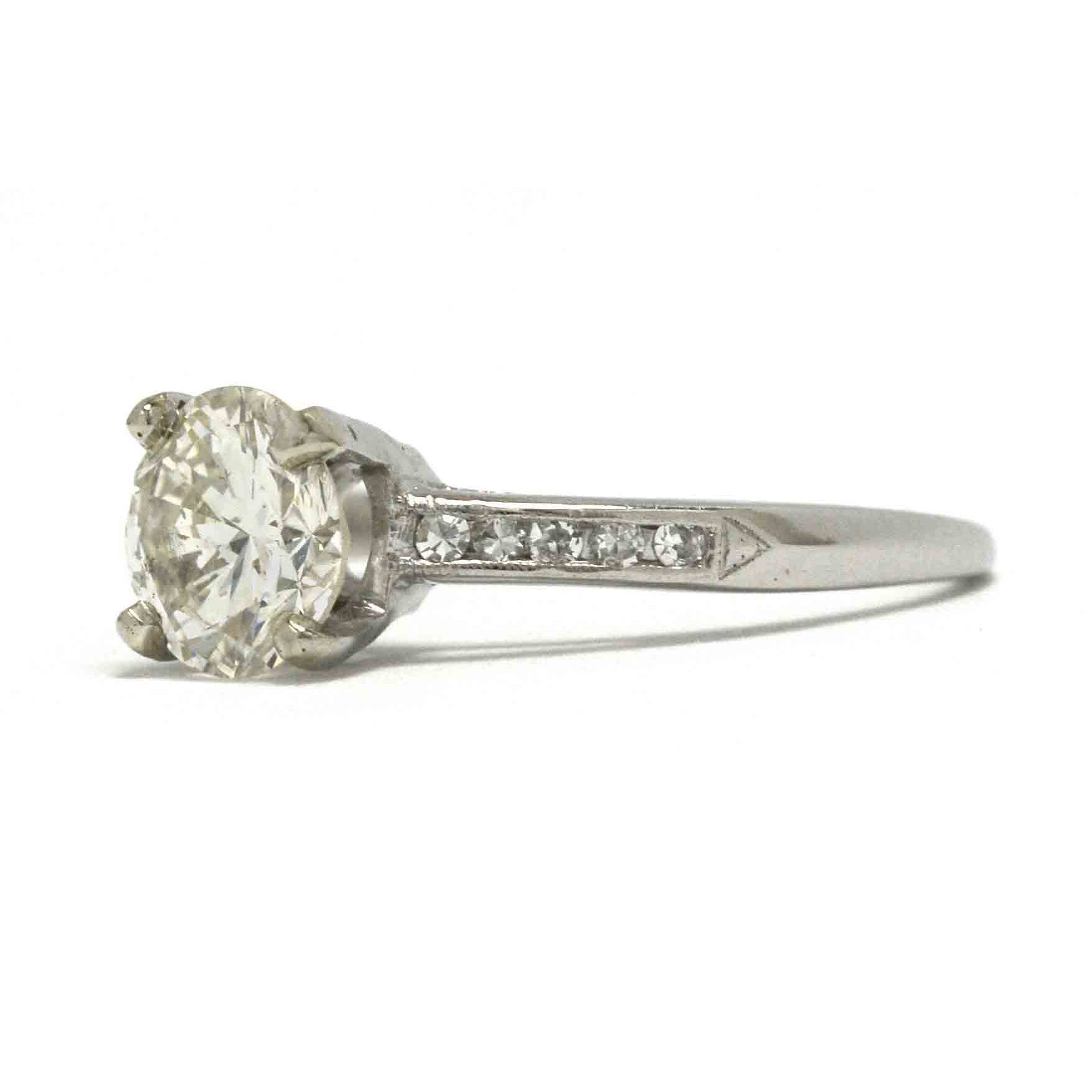 A size 6 1/2 platinum diamond solitaire wedding ring.