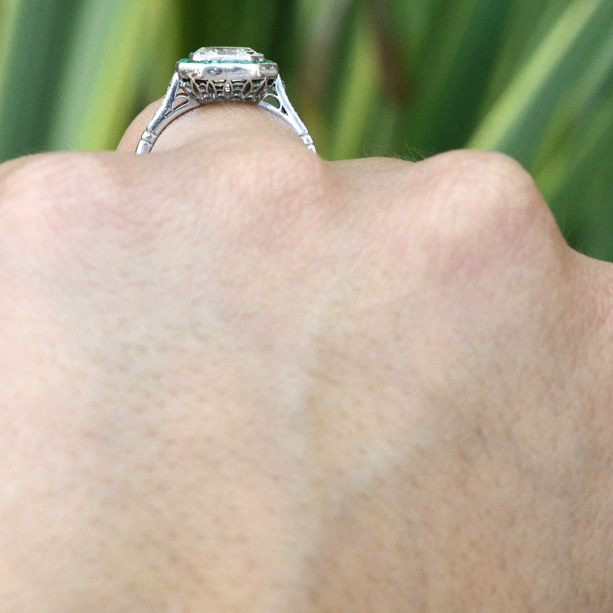 This diamond emerald ring sits low to your finger.