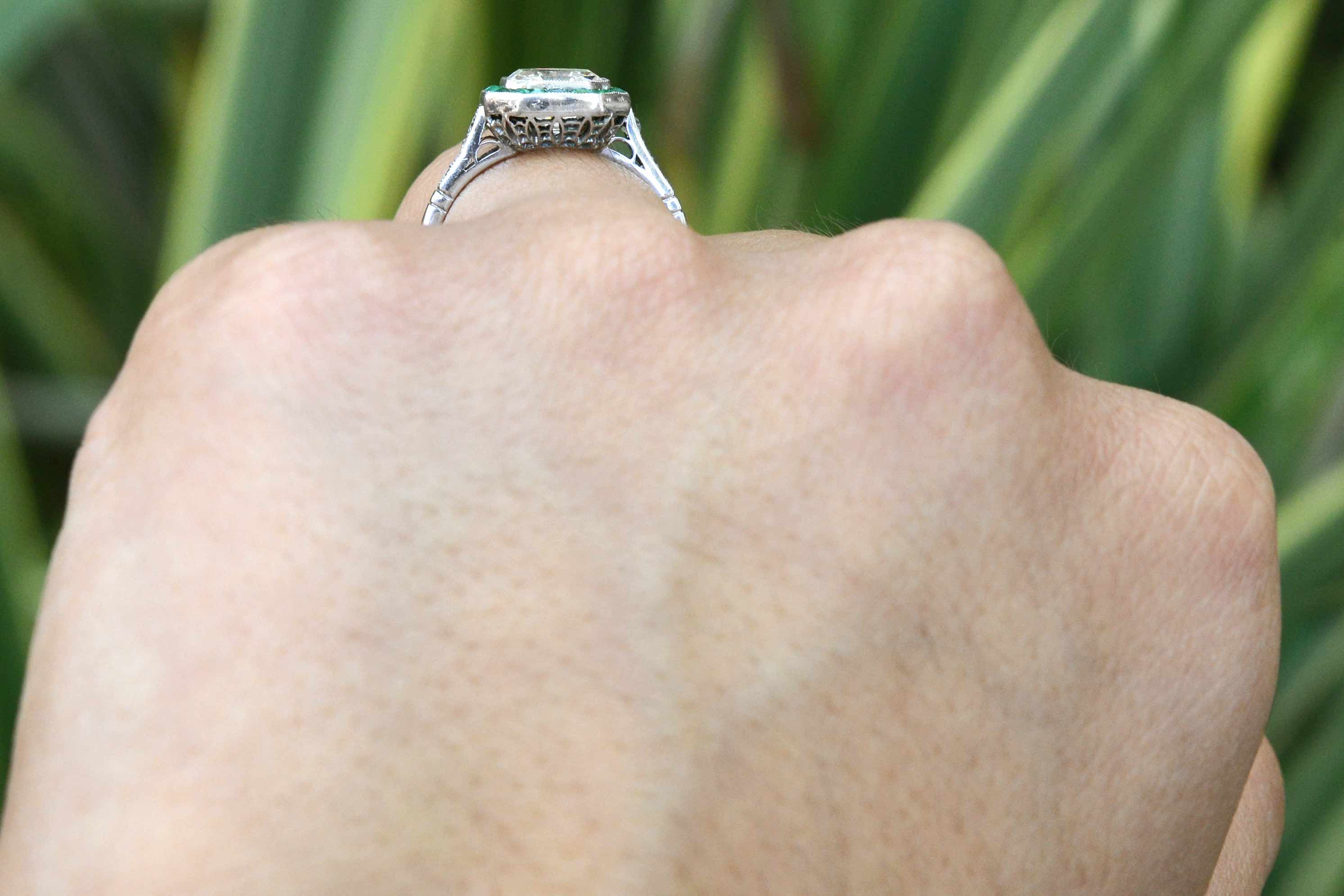 This diamond emerald ring sits low to your finger.