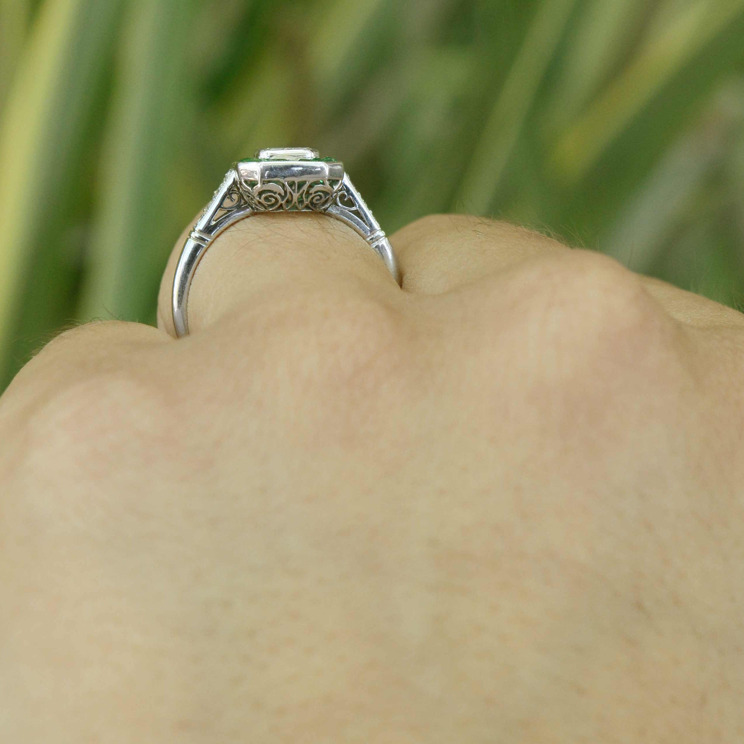 Fancy filigree is displayed underneath this new platinum engagement ring.