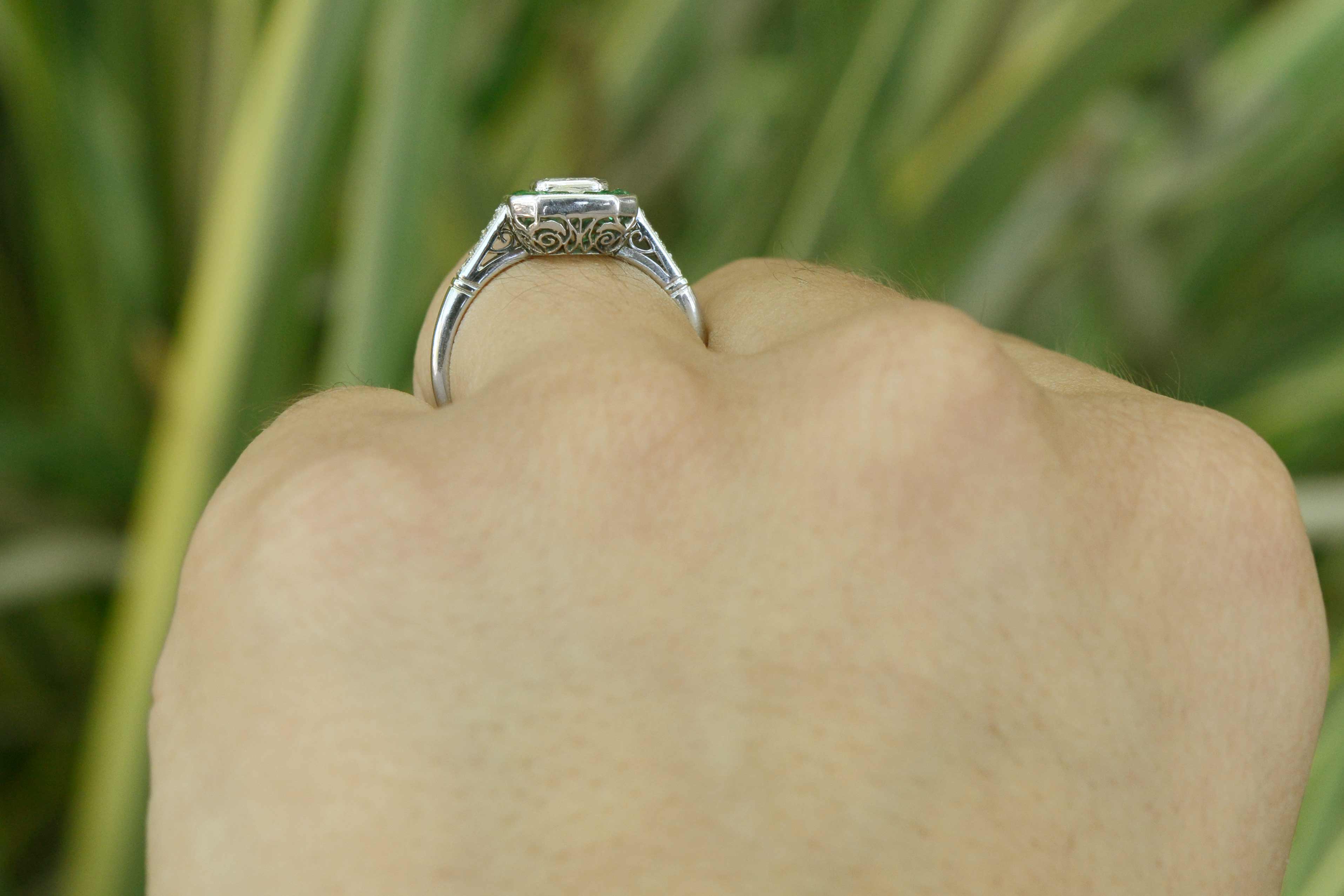 Fancy filigree is displayed underneath this new platinum engagement ring.