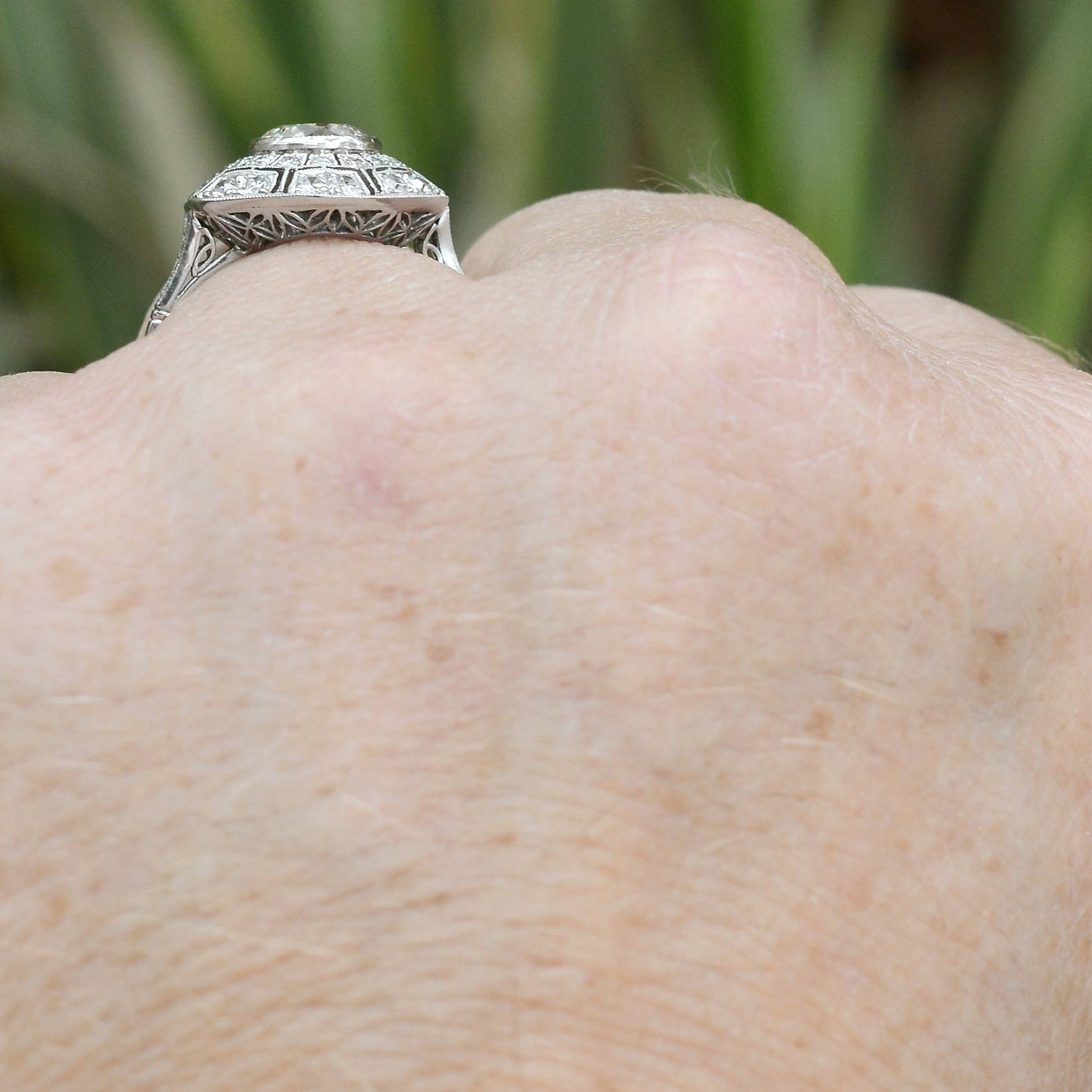 Over 1 carat diamonds cluster ring.