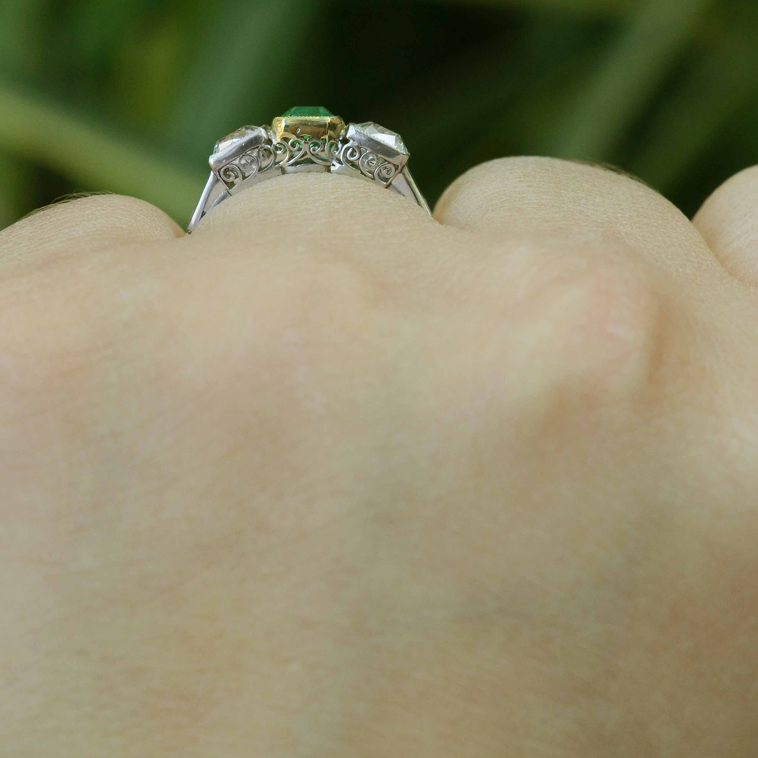 A fancy twisted filigree platinum and 18k gold engagement ring.