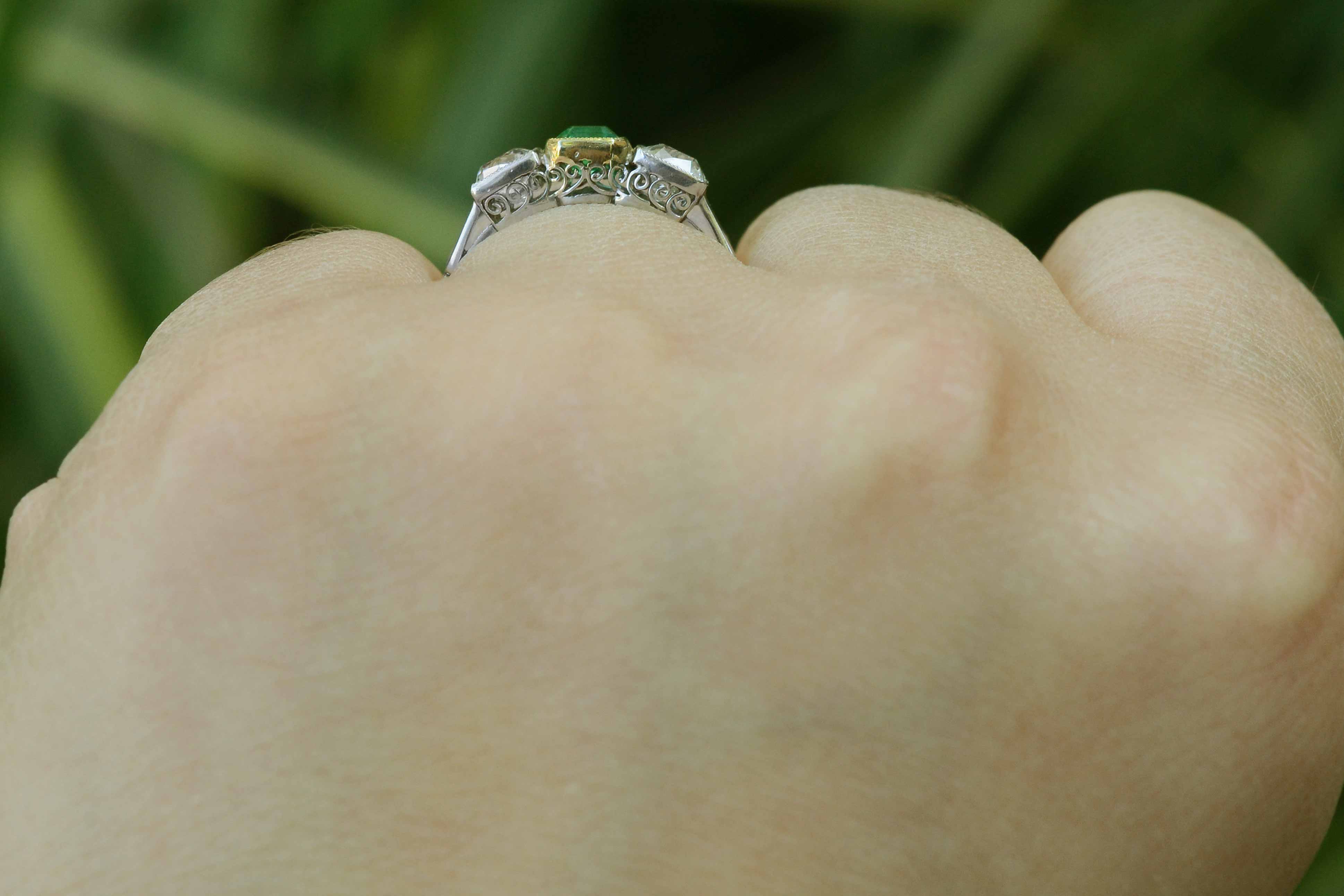 A fancy twisted filigree platinum and 18k gold engagement ring.
