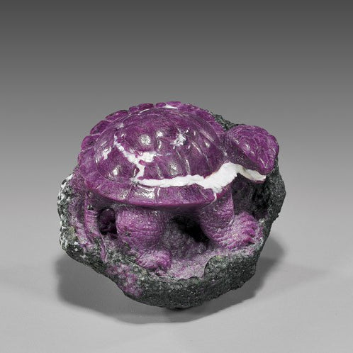 A piece of African zoisite that Ronald Stevens carved into a turtle.