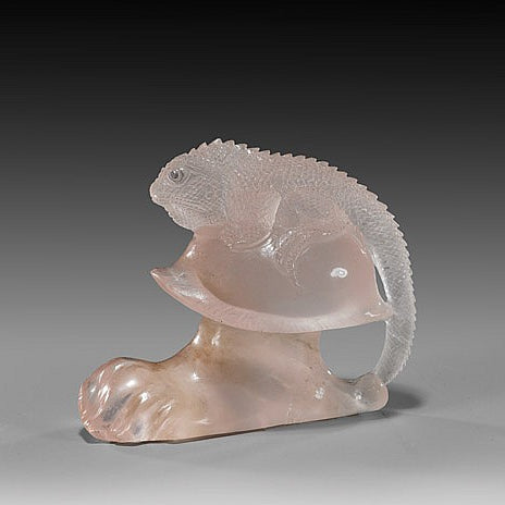 A Ronald Stevens lizard, carved from a fine piece of rose quartz.