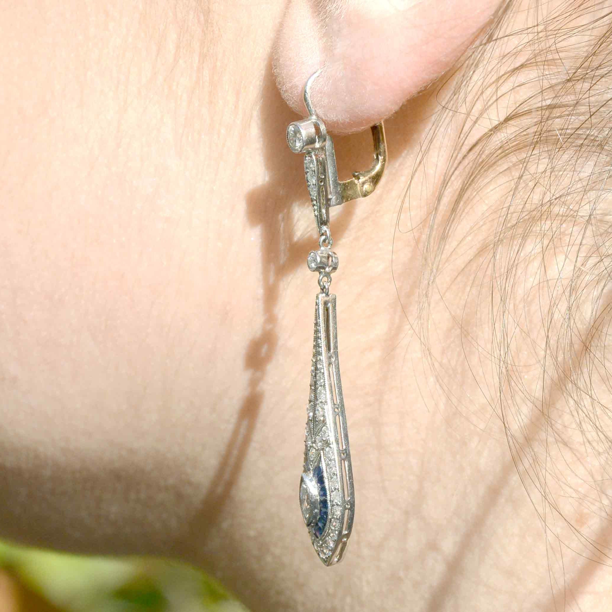 Teardrop shape, Art Deco inspired diamond blue sapphire earrings.