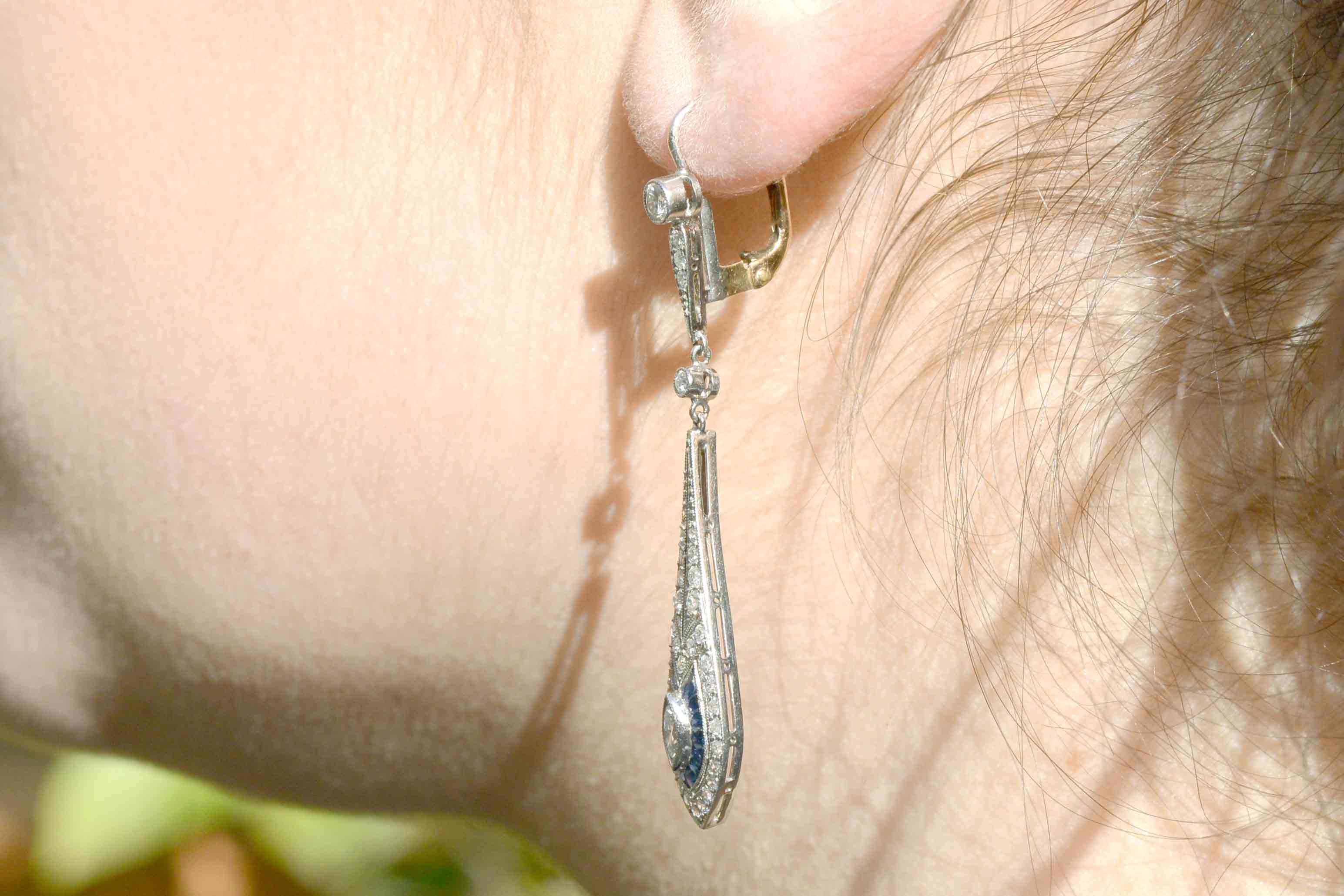 Teardrop shape, Art Deco inspired diamond blue sapphire earrings.