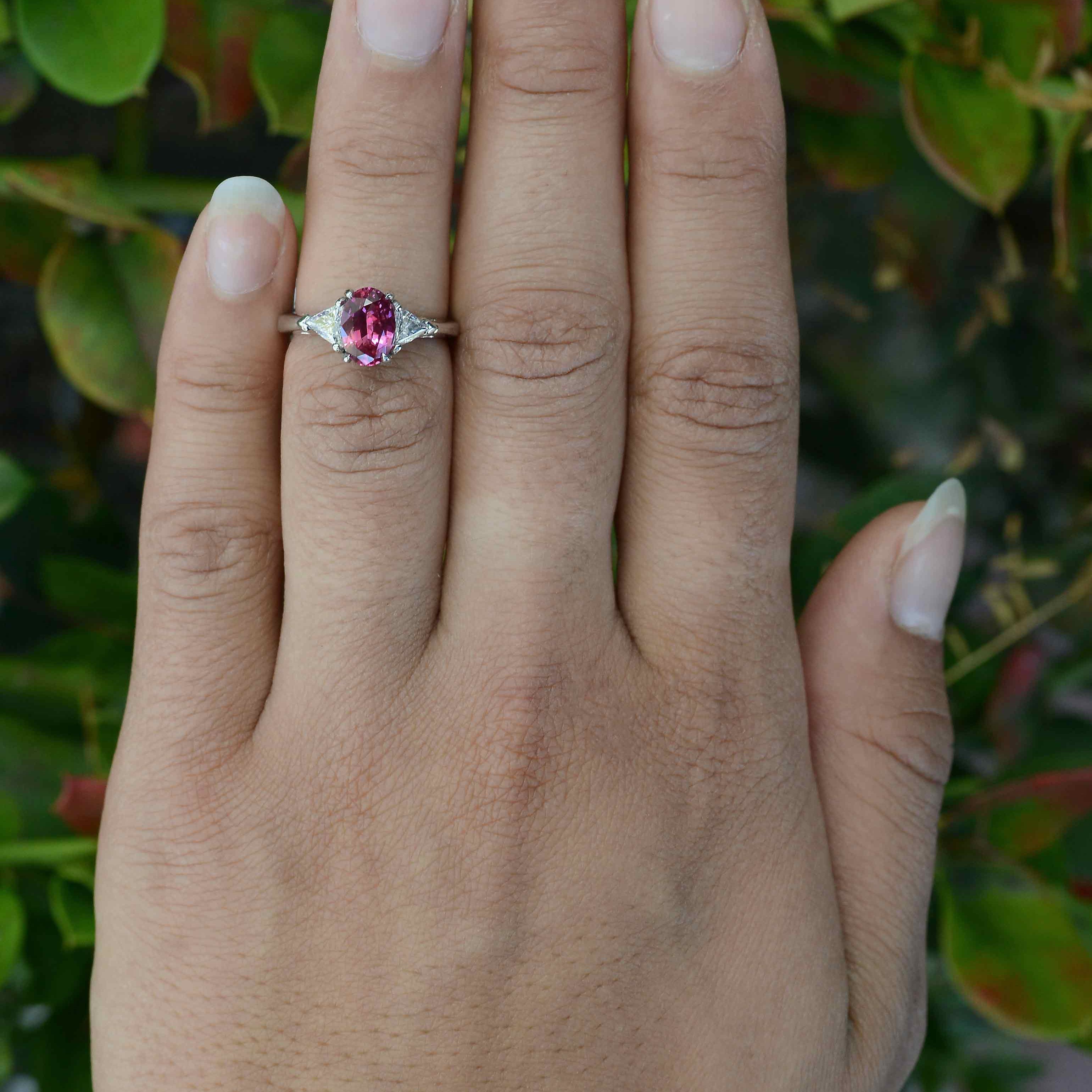 A vintage neo classical pink sapphire diamond platinum trinity engagement ring from the 1990s.
