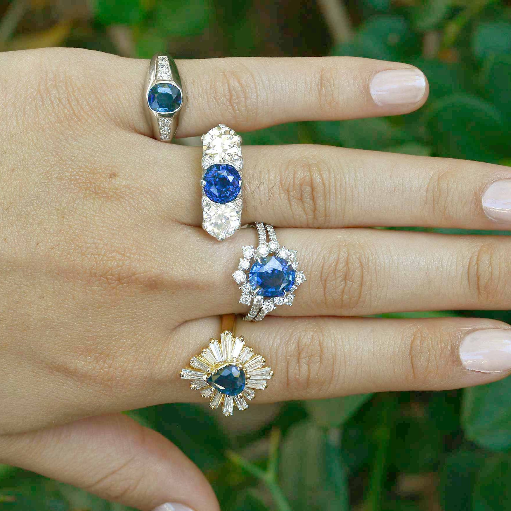 Antique blue sapphire diamond cluster wedding rings.