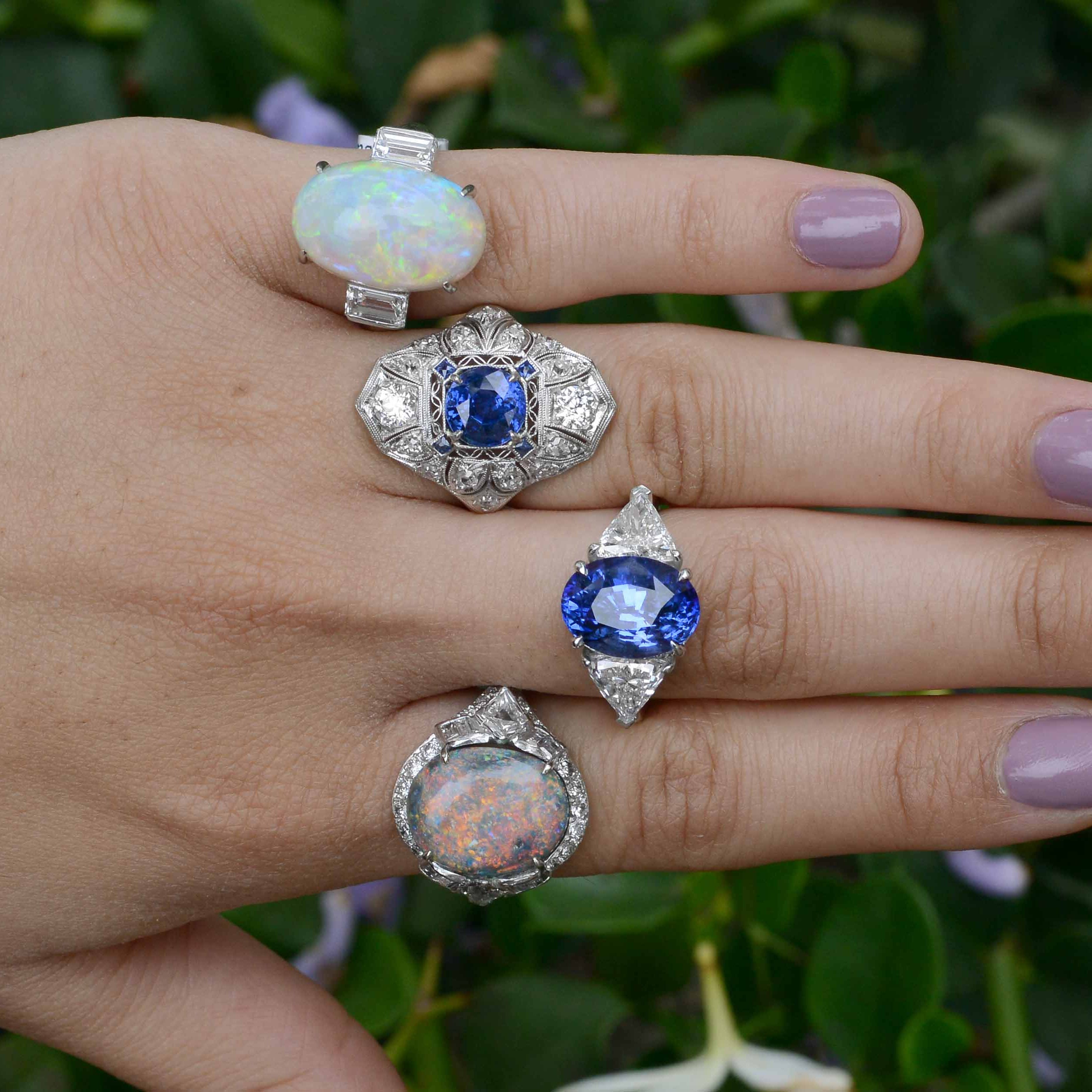 Big gemstone and diamonds cocktail rings.