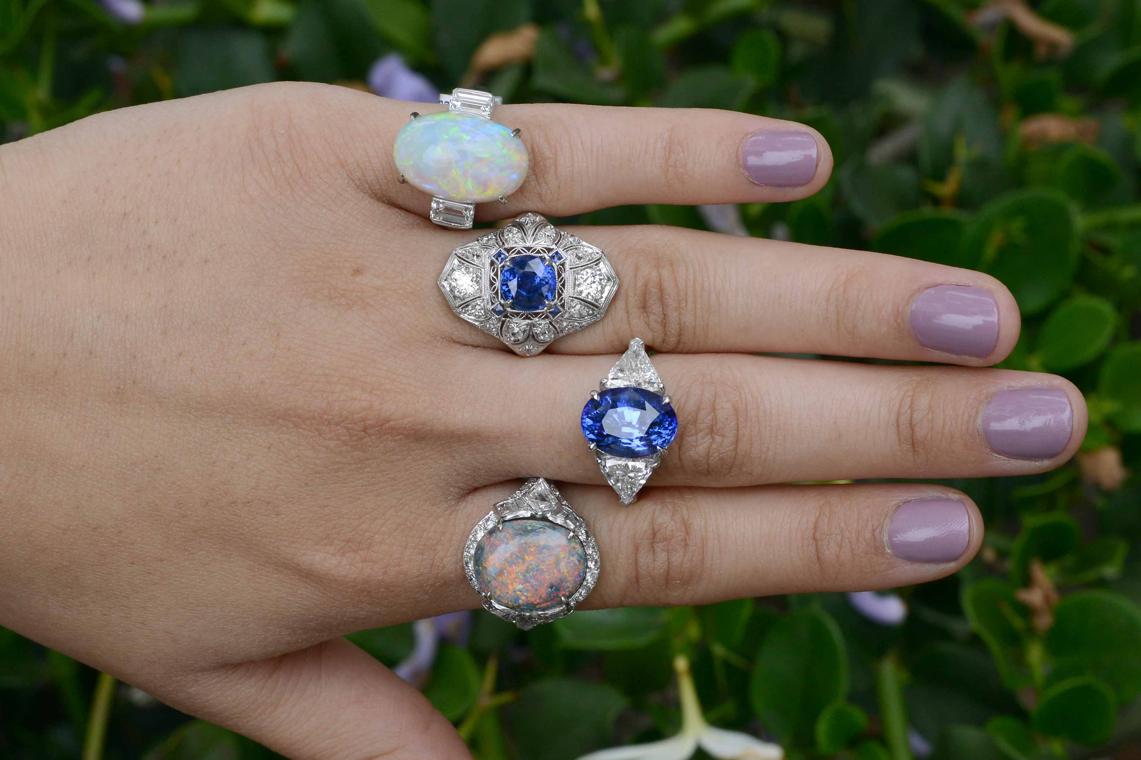 Big gemstone and diamonds cocktail rings.