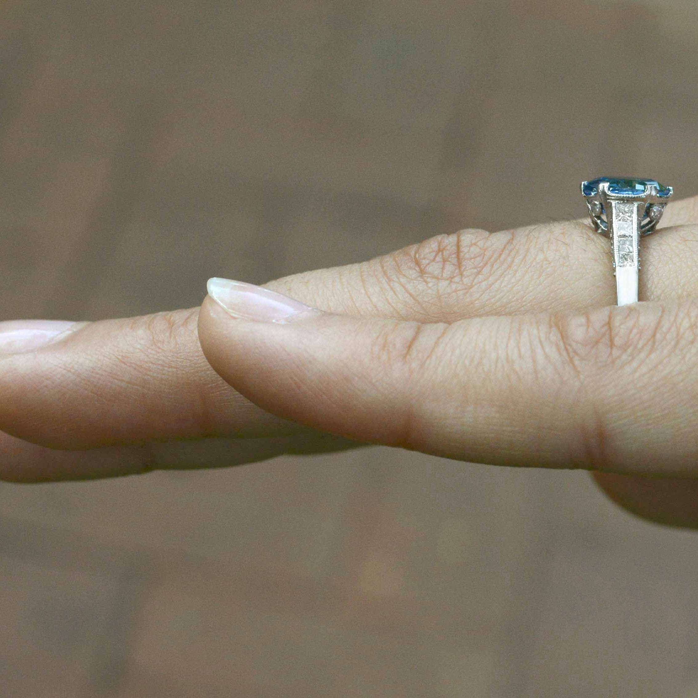 There is over 2 carats of natural diamonds and blue sapphire in this vintage solitaire ring.