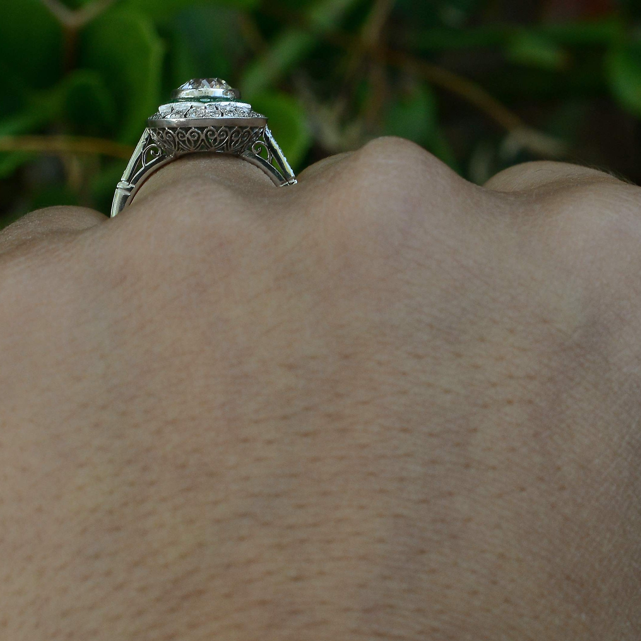 An antique diamond set in a platinum Art Deco revival ring setting.