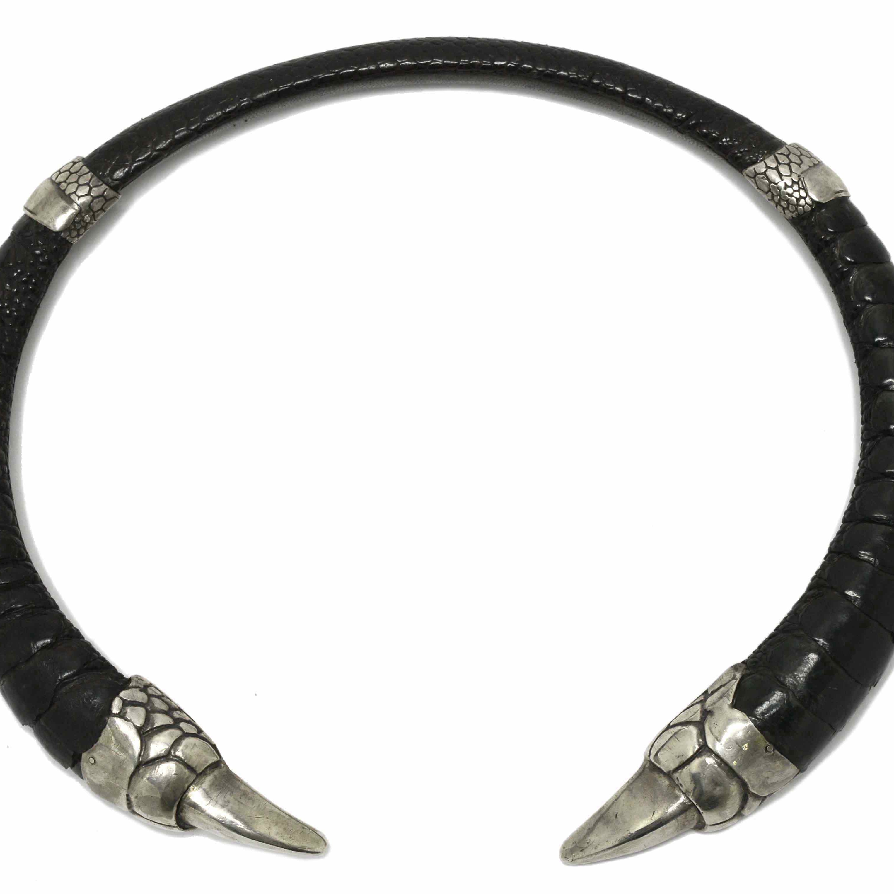 A new sterling silver claw statement necklace with black leather.
