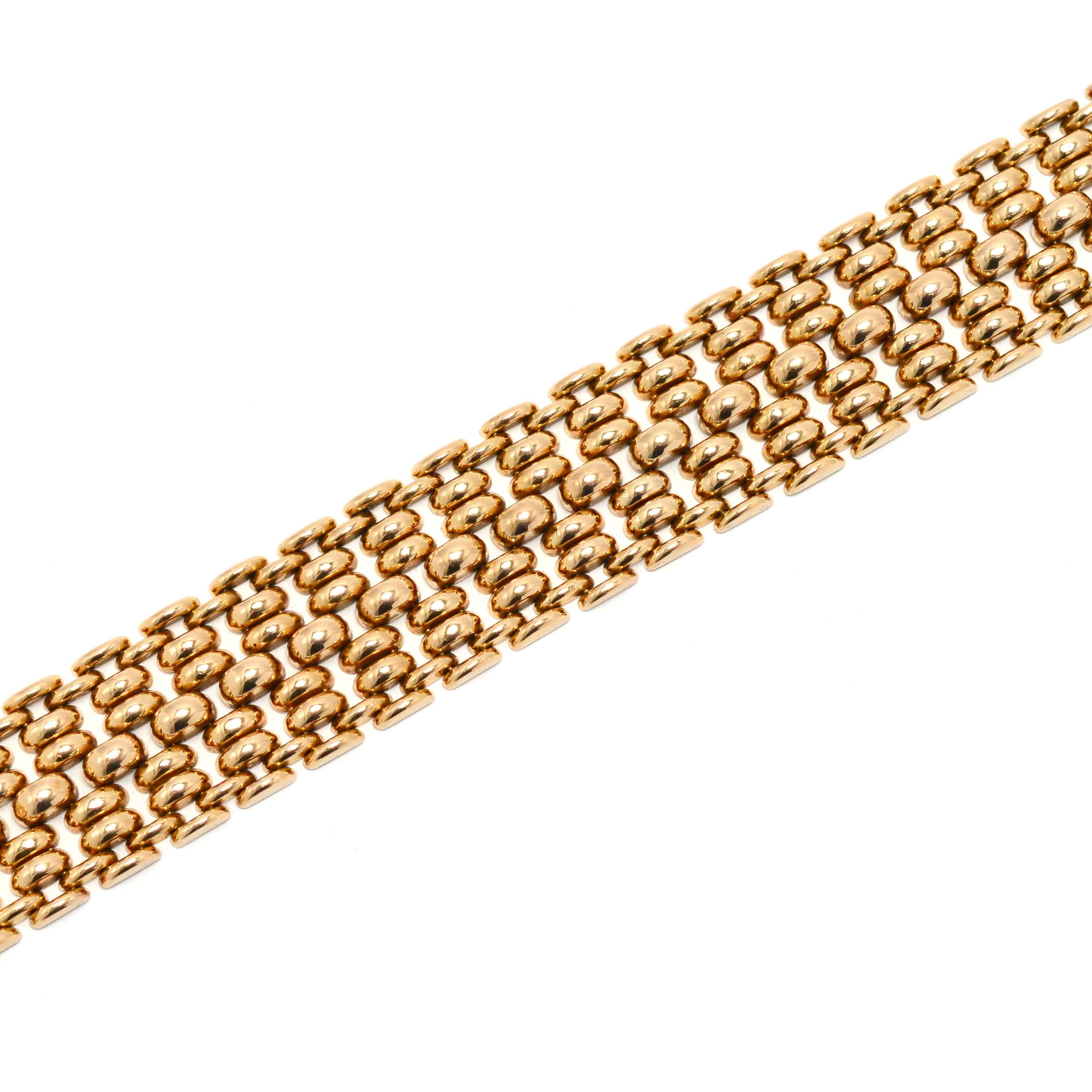 A 1940s, industrial design, tank tread gold bracelet.