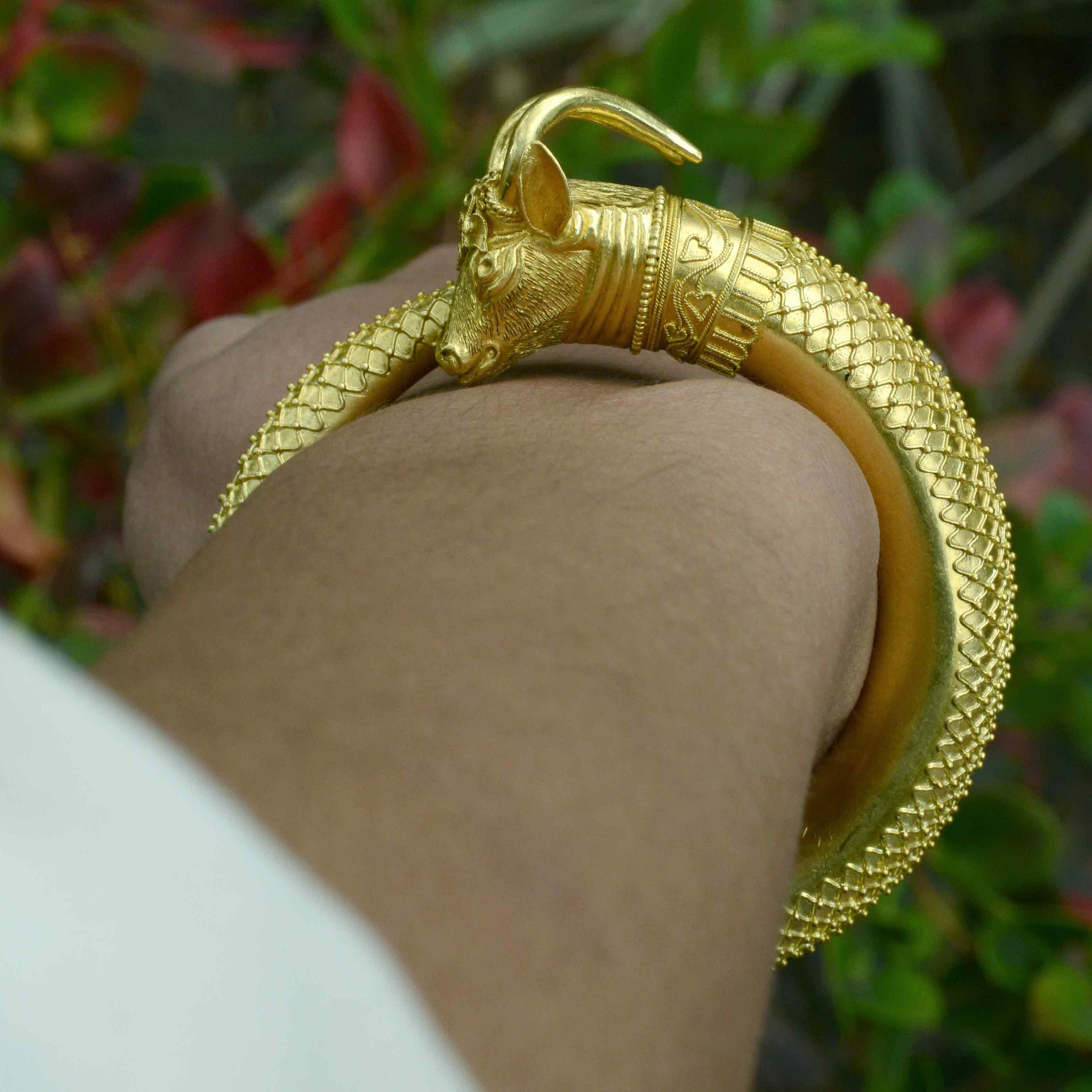 This high karat gold ram head bracelet shows great detail in the skin textures.