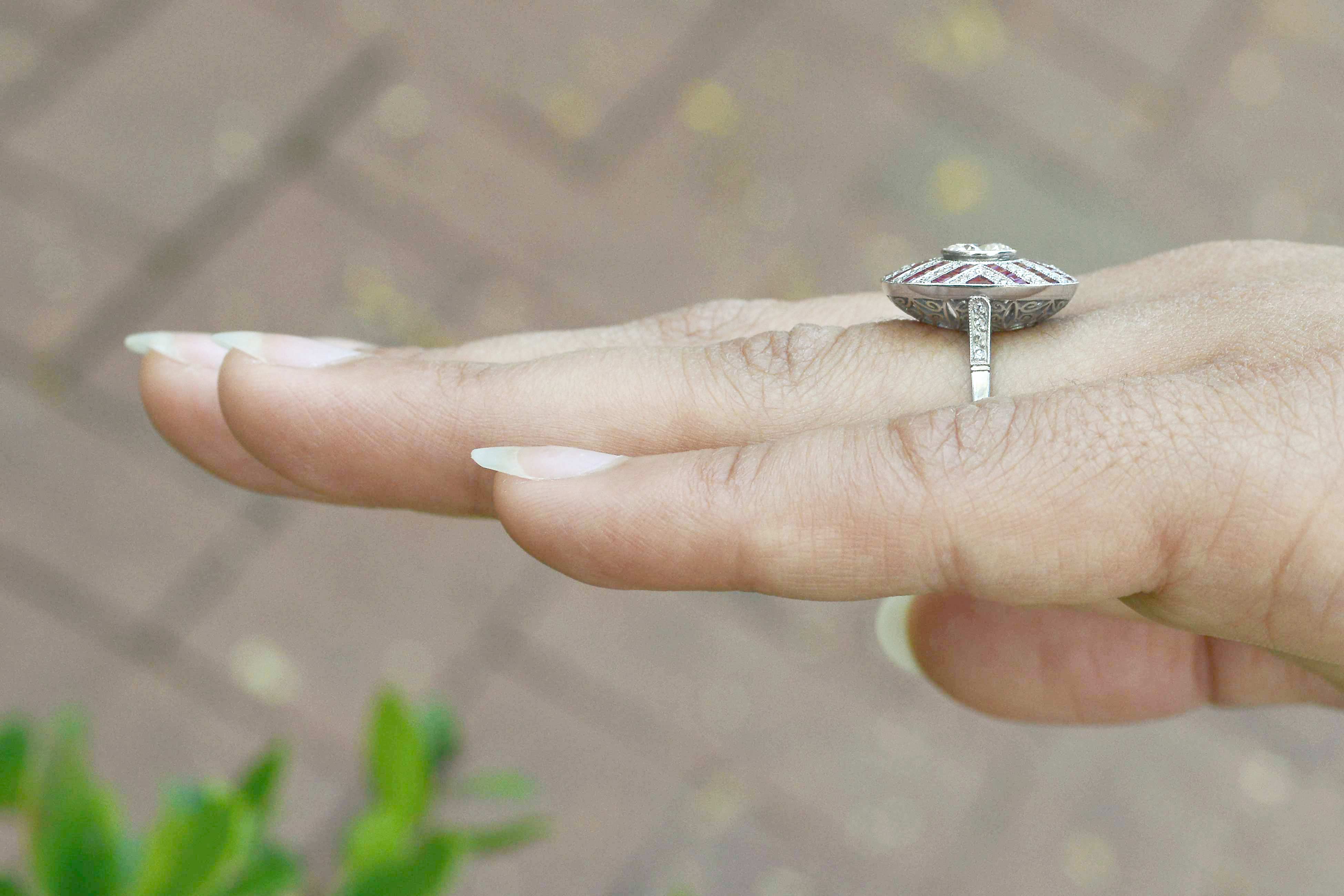 An Art Deco style engagment ring with old world antique diamonds.