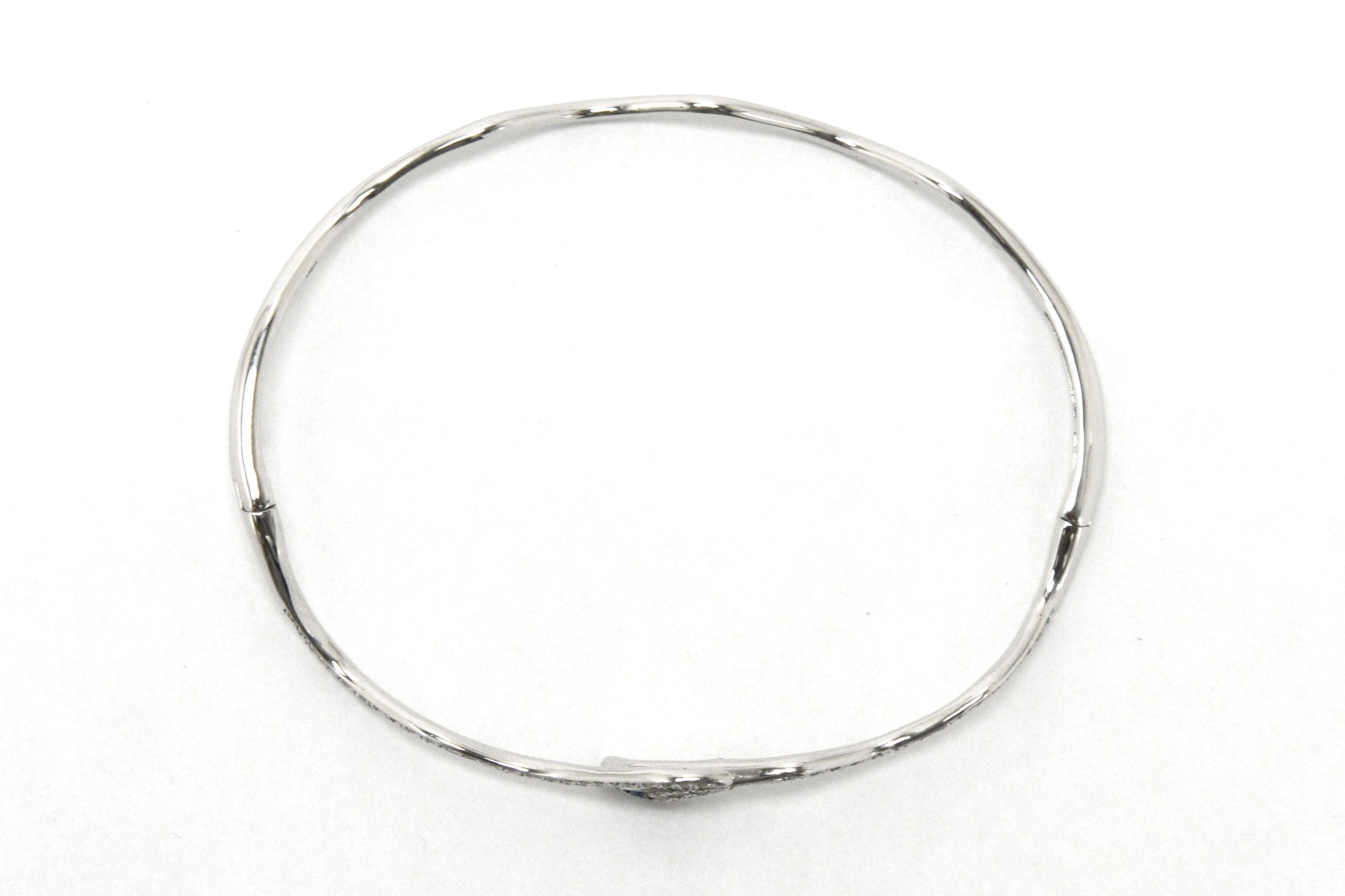 A thin and curvy modern bracelet.