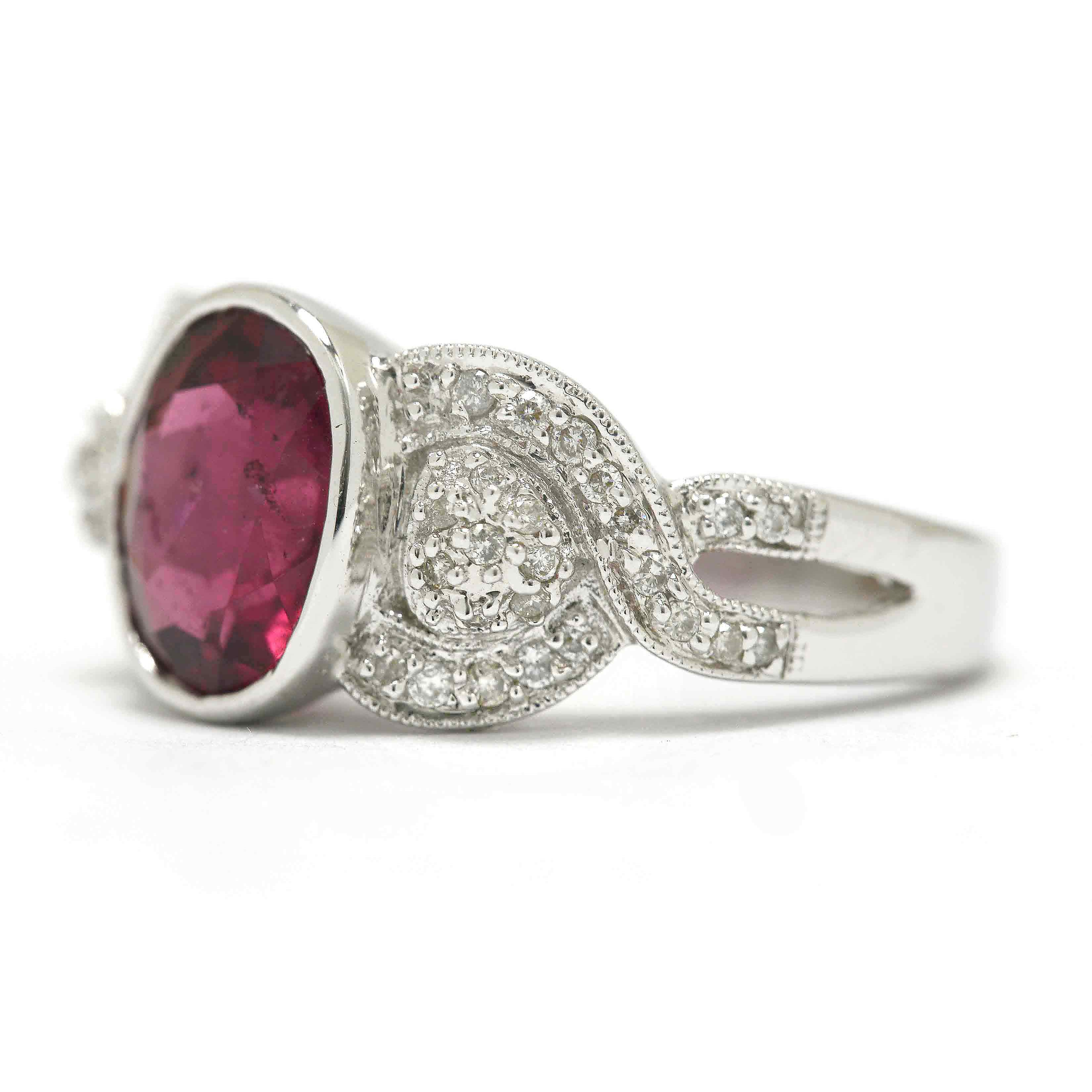 An 18k white gold diamond crossover band.