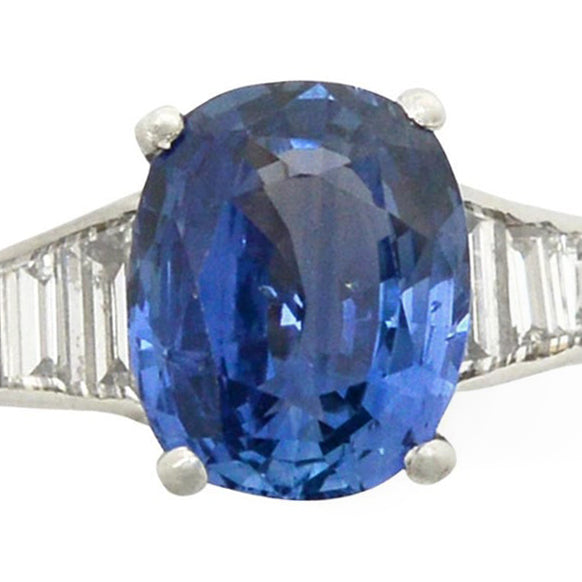 A no heat 5 carat oval blue sapphire engagement ring.