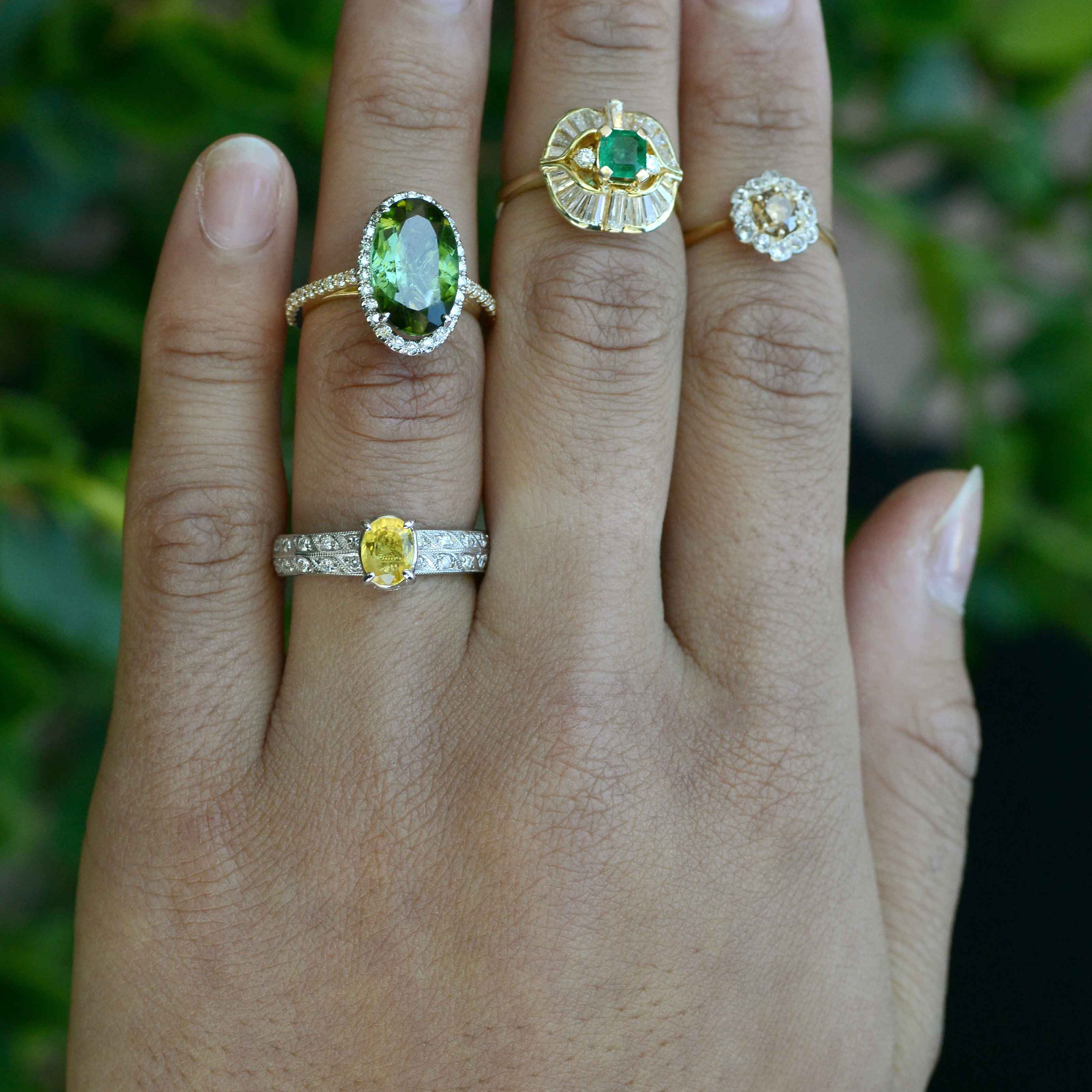 Vintage gemstone and diamond gold wedding rings.