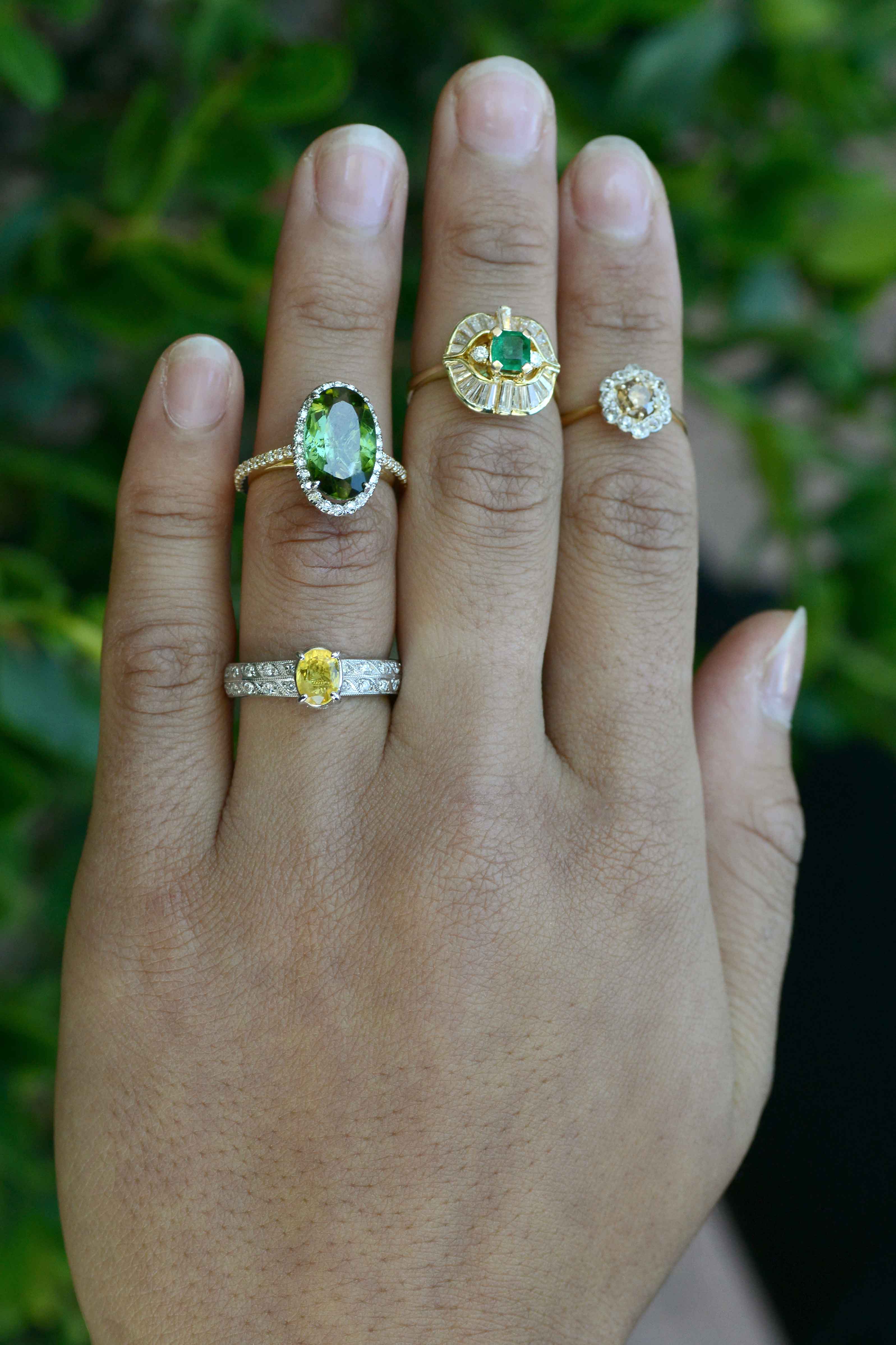 Vintage gemstone and diamond gold wedding rings.