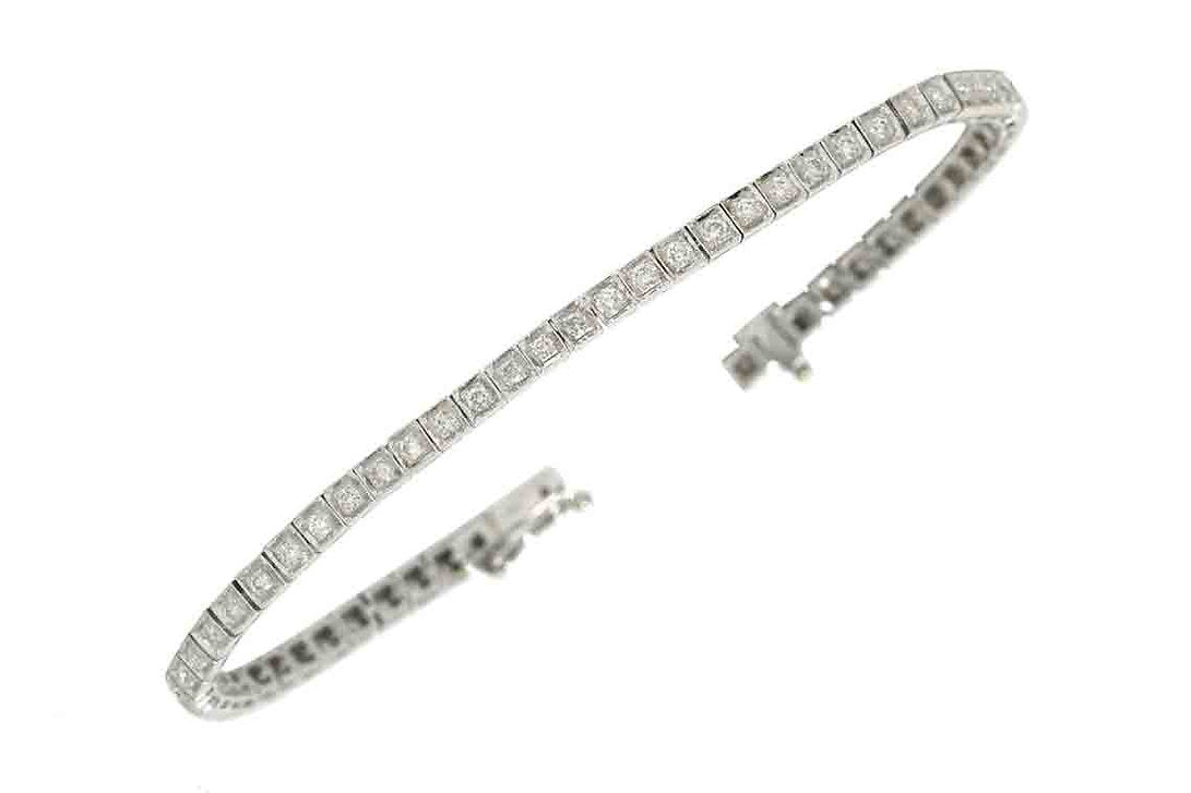 A straight line, 18k white gold Art Deco diamond bracelet.