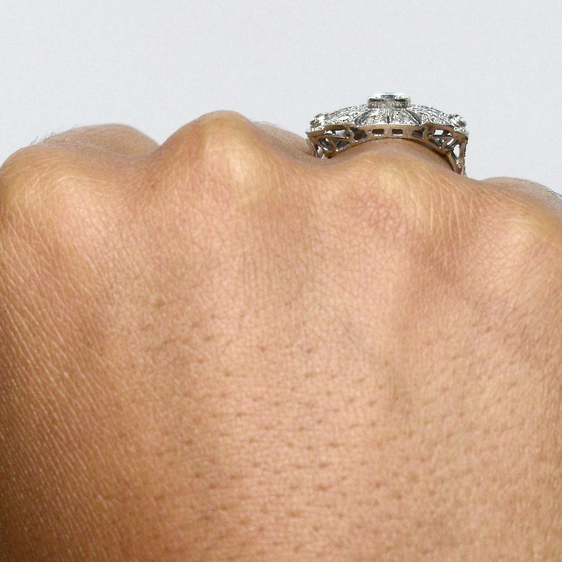 An oval shaped Art Deco sunburst, platinum diamond statement ring.