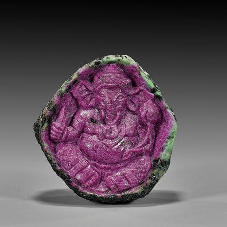 A chunk of black zoisite figure carved into the elephant headed god Ganesh.