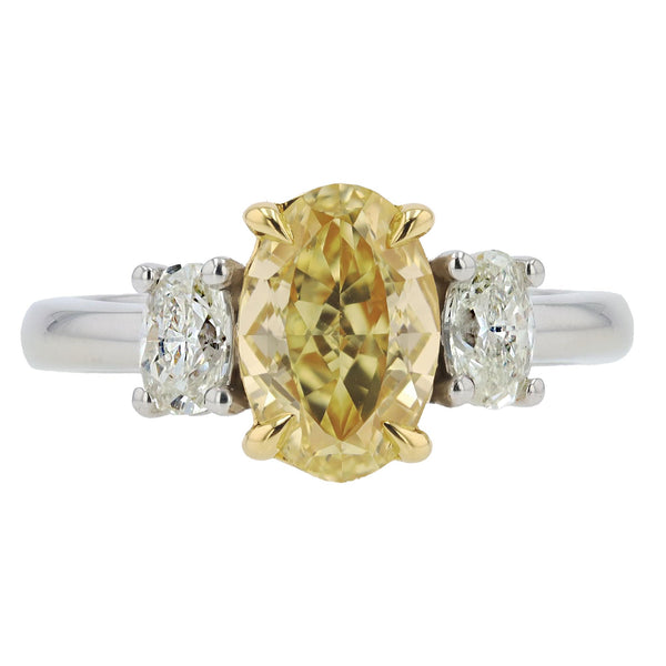 GIA 1.50 Carat Fancy Yellow Oval Diamond 3 Stone Platinum Engagement Ring