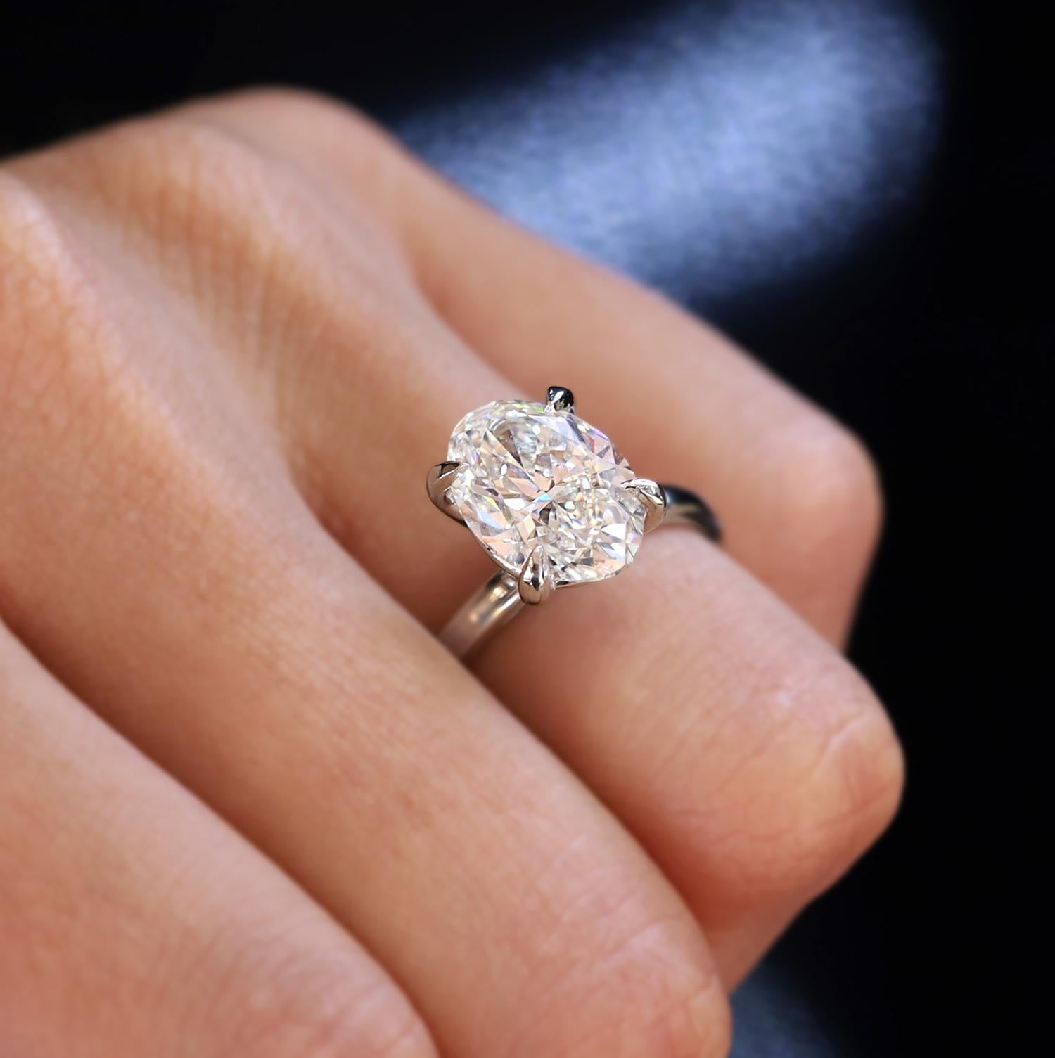 GIA Certified 3.04 Carat Oval Diamond H/SI1 Platinum Solitaire Engagement Ring