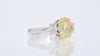 GIA 1.50 Carat Fancy Yellow Oval Diamond 3 Stone Platinum Engagement Ring