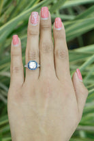 A one and a half carat diamond octagon engagement ring with sapphires.