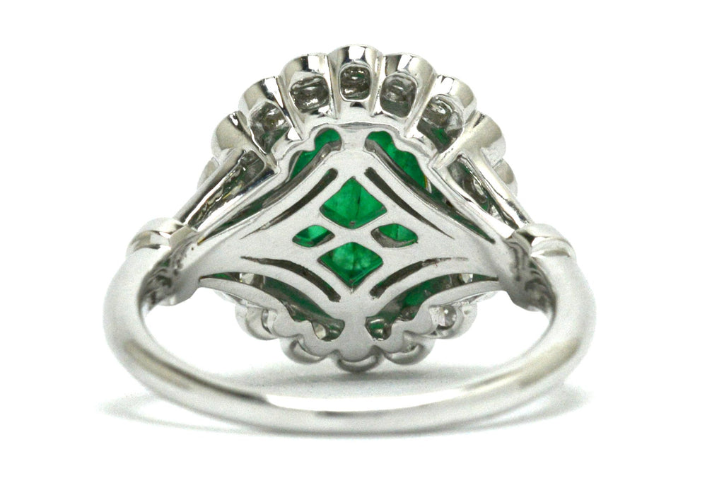 A white gold Edwardian emerald cocktail ring.