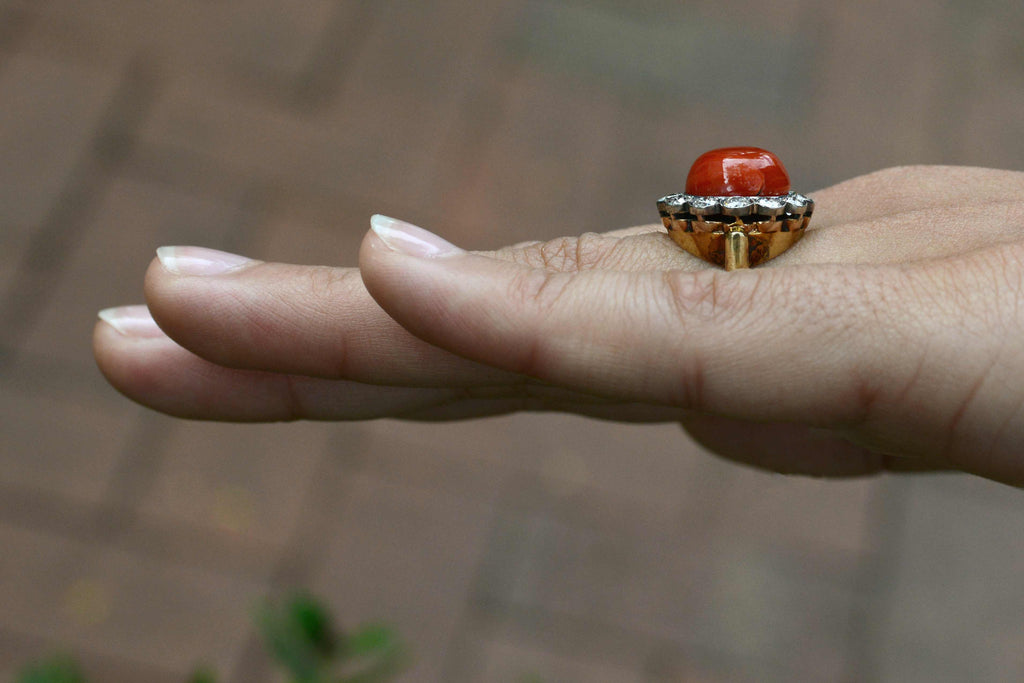 A late 1800's, antique coral dome statement ring.