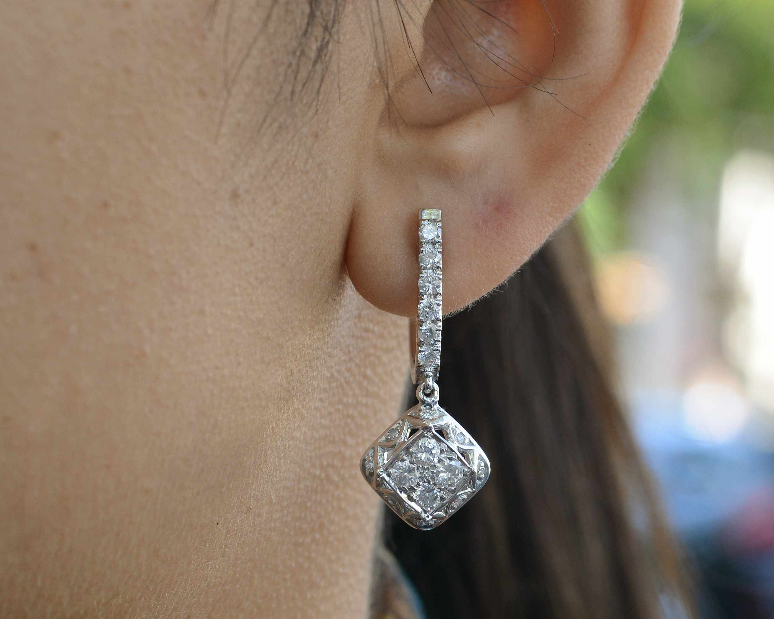 Modern estate diamond dangle earrings from the 2000s.