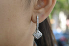 Modern estate diamond dangle earrings from the 2000s.