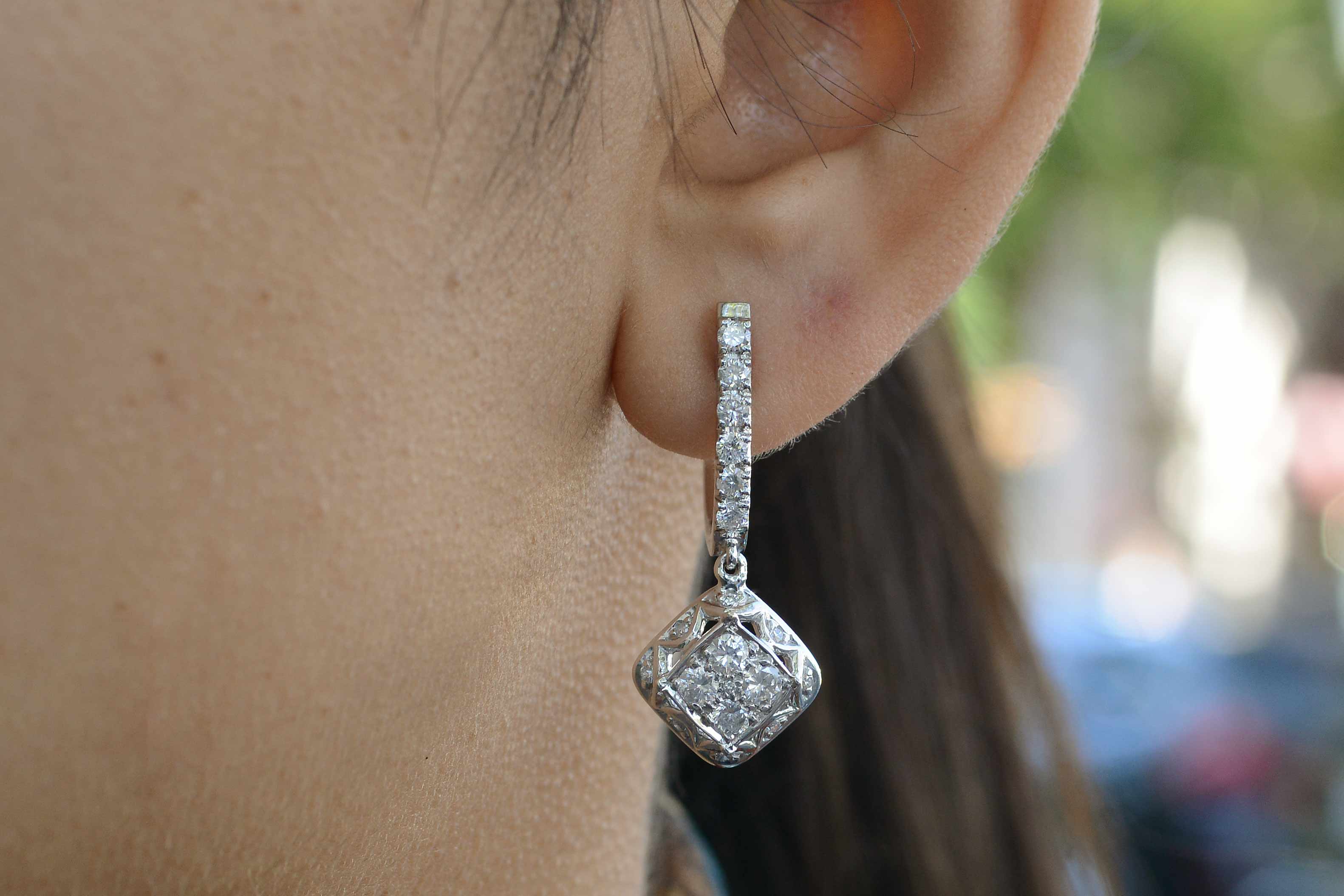 Modern estate diamond dangle earrings from the 2000s.