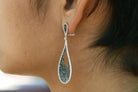 18k gold 2" long teardrop diamond earrings. 