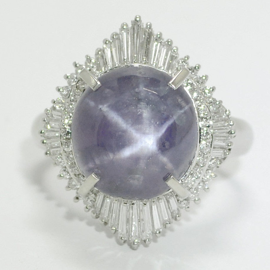 A size 11 purple star sapphire platinum statement ring.