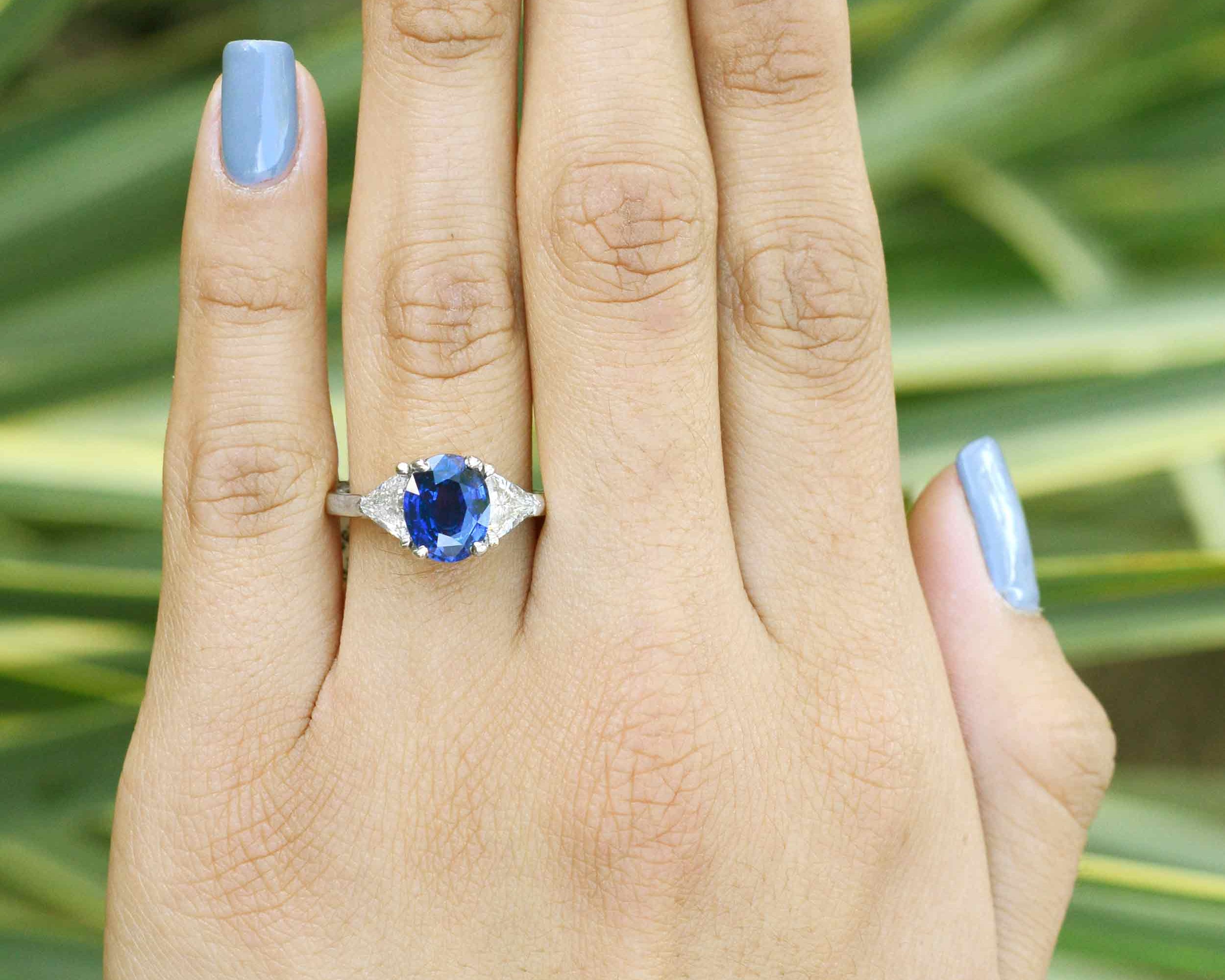 A size 6.75 diamond and blue sapphire 3 stone ring.