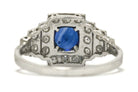 Antique, tiered round blue sapphire platinum engagement ring.