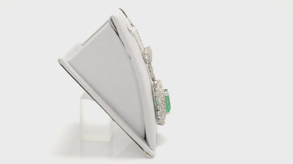A contemporary 8 carat emerald necklace design from the 21st century with 3 carats of diamonds.