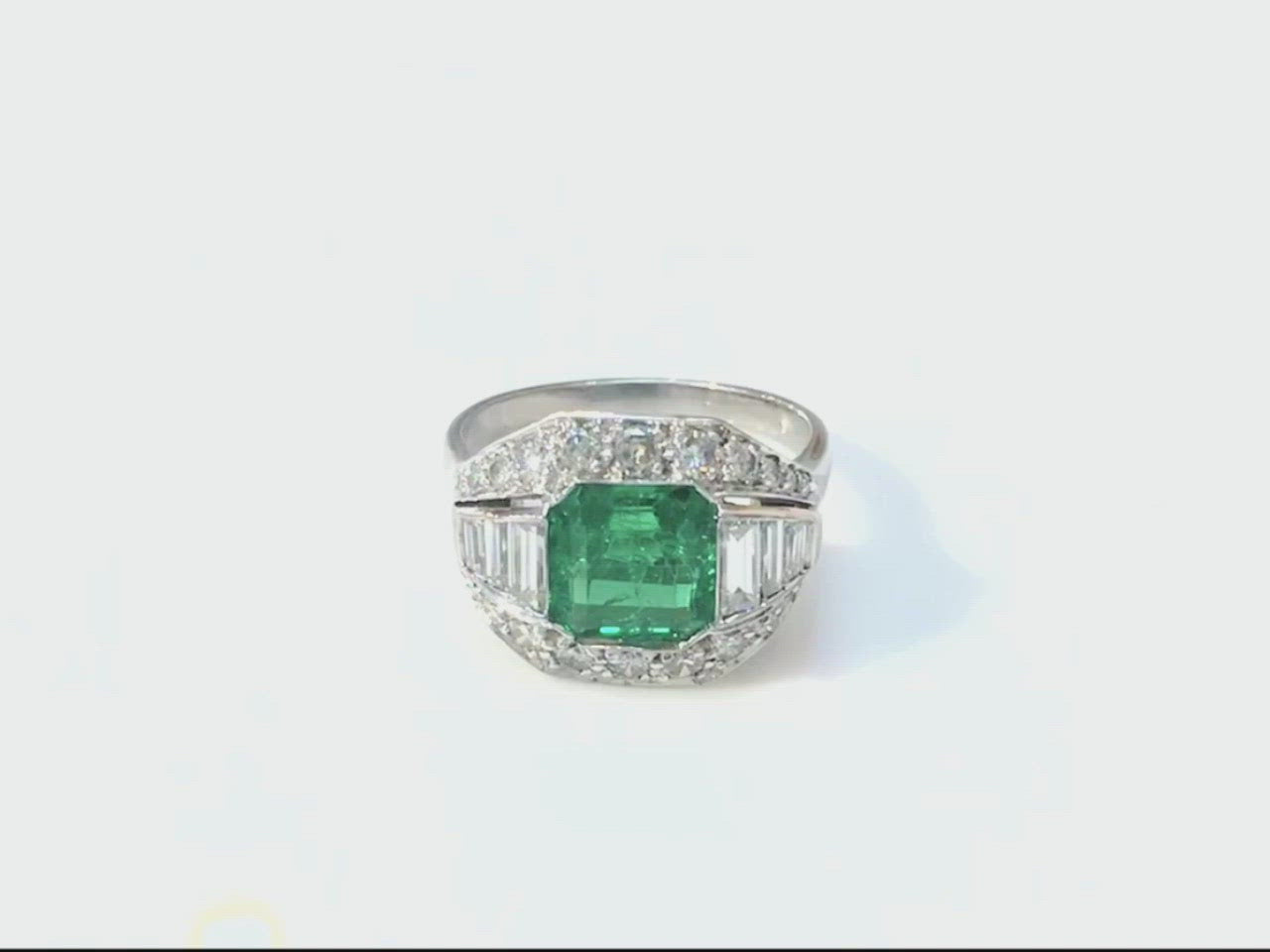 An emerald and diamond Art Deco engagement ring from the 1920s.