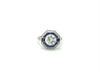 A geometric 2 carat round brilliant diamond is set in the middle of a blue sapphire halo engagement ring.