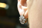 A unique double diamond halo cluster earrings design.